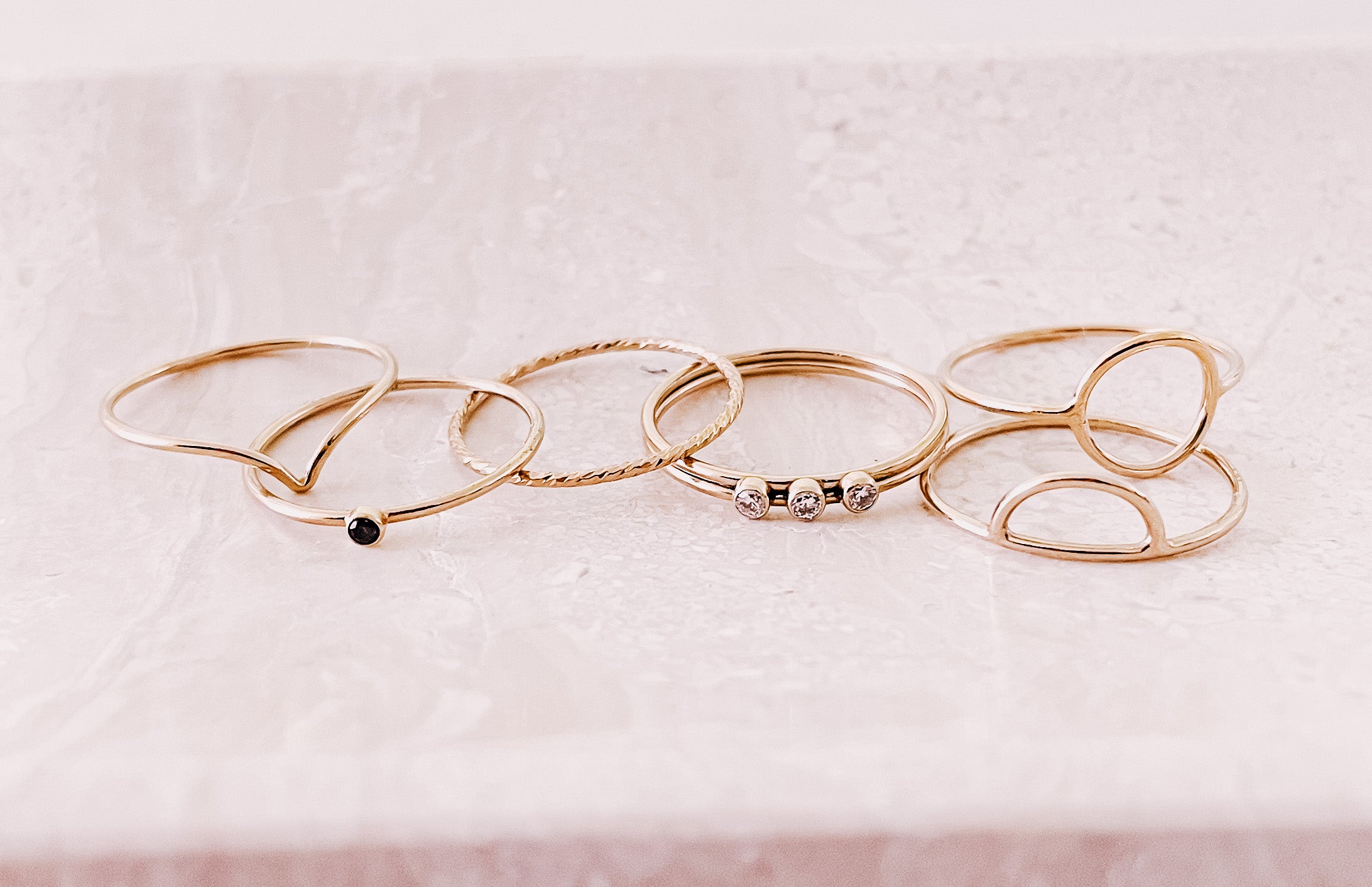 Gold Filled stacking rings on a jewellery tray by lady startup Australian jewellery label, AW Boutique.