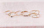 Load image into Gallery viewer, AW Boutique&#39;s gold filled stackable rings on a jewellery tray.
