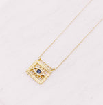 Load image into Gallery viewer, Evil Eye square pendant hanging from a dainty cable link gold filled chain necklace.  Evil Eye is a protective symbol and talisman.  Protection jewellery.
