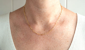 Model wearing AW Boutique's Paperclip Chain Necklace at the extendable 17 inches length.