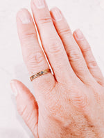 Load image into Gallery viewer, Three stacker rings worn on hand, by lady startup Australian jewellery label, AW Boutique.
