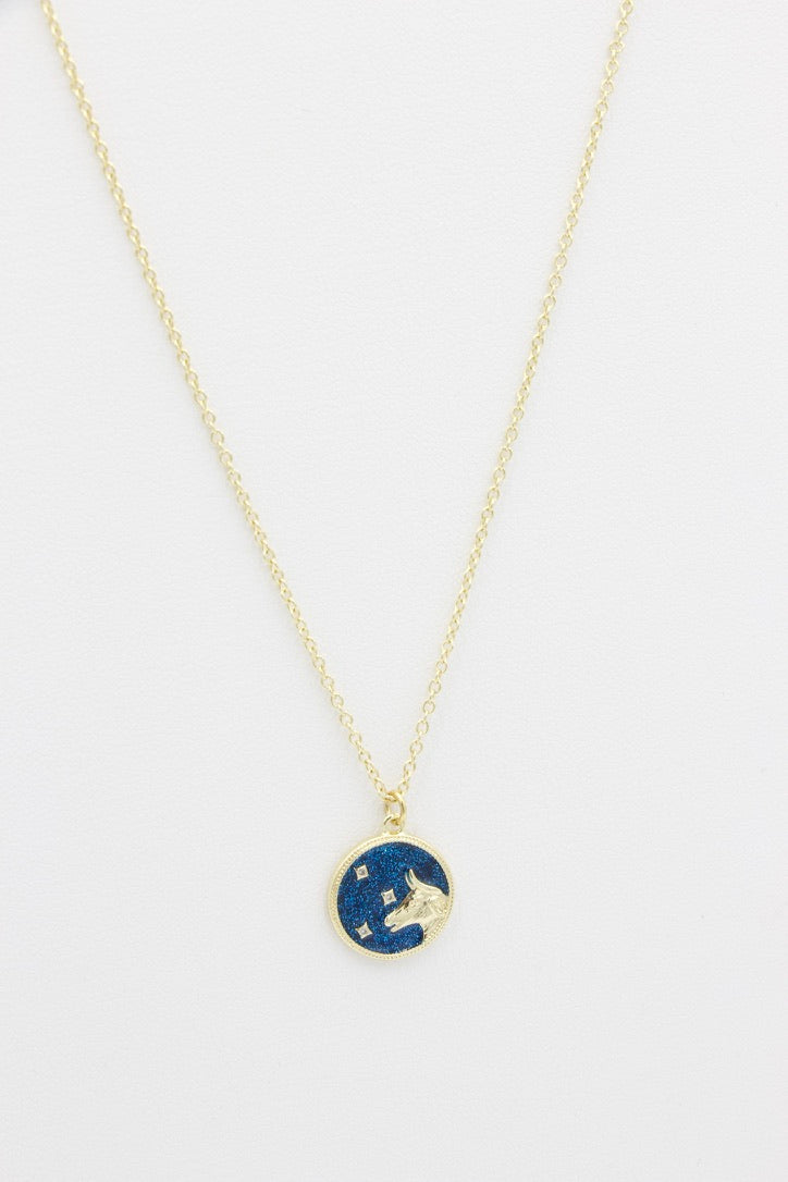 AW Boutique's Zodiac Astro Coin is a dainty pendant full of sparkle and shine.  This piece adds a pop of colour to your everyday wear and at 18 inches is a great length to mix and layer your other chains with.  Proudly wear either your own star sign or the star sign of a loved one close to your heart.  Zodiac shown is Taurus.