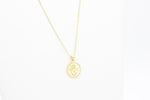 Load image into Gallery viewer, AW Boutique&#39;s gold filled 18 inch box chain with a vintage looking Hamsa coin pendant. The Hamsa has small inscriptions and an evil eye on the hand. Pendant has rope effect edging. Part of Protection collection. Gold filled jewellery.
