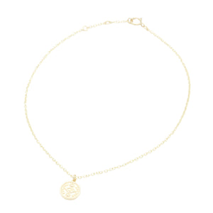 AW Boutique's Mini Evil Eye Gold Coin Anklet.