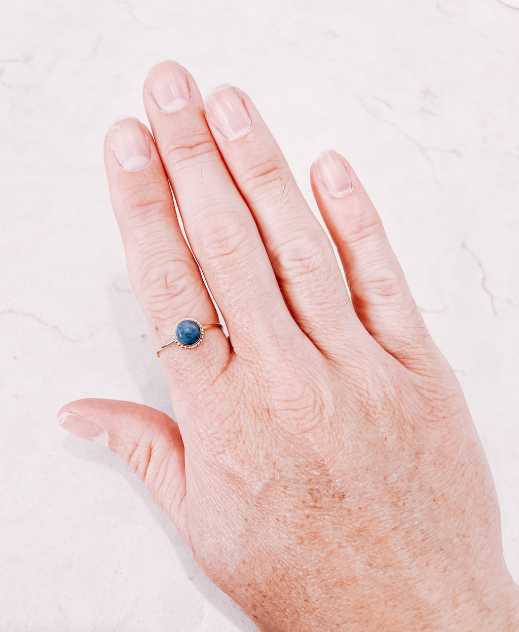 Lapis Lazuli gold filled ring worn on hand, by lady startup Australian jewellery label, AW Boutique.