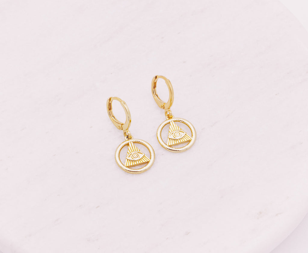All-Seeing Eye or Eye of Providence protection symbol on a gold filled huggie earring.  