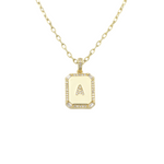 Load image into Gallery viewer, AW Boutique&#39;s gold filled 16 inch cable chain necklace finished with a dainty initial pendant with cubic zirconia detail. A initial shown.
