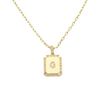 Load image into Gallery viewer, AW Boutique&#39;s gold filled 16 inch cable chain necklace finished with a dainty initial pendant with cubic zirconia detail. G initial shown.
