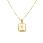 Load image into Gallery viewer, AW Boutique&#39;s gold filled 16 inch cable chain necklace finished with a dainty initial pendant with cubic zirconia detail. H initial shown.

