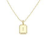 Load image into Gallery viewer, AW Boutique&#39;s gold filled 16 inch cable chain necklace finished with a dainty initial pendant with cubic zirconia detail. I initial shown.
