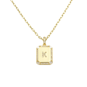 AW Boutique's gold filled 16 inch cable chain necklace finished with a dainty initial pendant with cubic zirconia detail. K initial shown.