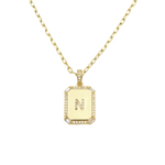Load image into Gallery viewer, AW Boutique&#39;s gold filled 16 inch cable chain necklace finished with a dainty initial pendant with cubic zirconia detail. N initial shown.
