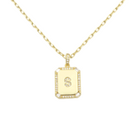 Load image into Gallery viewer, AW Boutique&#39;s gold filled 16 inch cable chain necklace finished with a dainty initial pendant with cubic zirconia detail. S initial shown.

