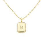 Load image into Gallery viewer, AW Boutique&#39;s gold filled 16 inch cable chain necklace finished with a dainty initial pendant with cubic zirconia detail. W initial shown.
