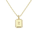Load image into Gallery viewer, AW Boutique&#39;s gold filled 16 inch cable chain necklace finished with a dainty initial pendant with cubic zirconia detail. Z initial shown.
