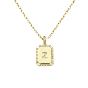 AW Boutique's gold filled 16 inch cable chain necklace finished with a dainty initial pendant with cubic zirconia detail. Z initial shown.