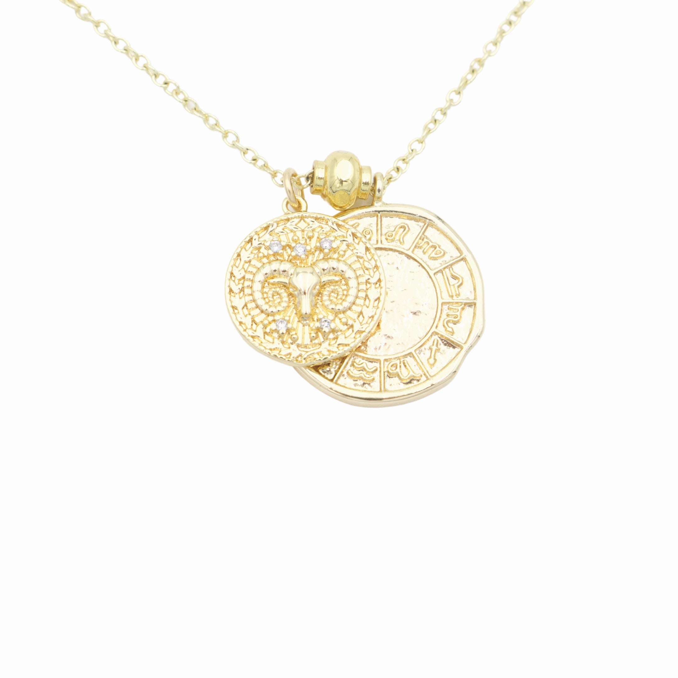 AW Boutique's dual zodiac coin necklace featuring a dainty necklace chain, zodiac rustic coin charm, and your chosen star sign coin charm. Charms separated by a gold bead. Part of the Celestial Collection. Gold filled jewellery. Option shown is Aries.