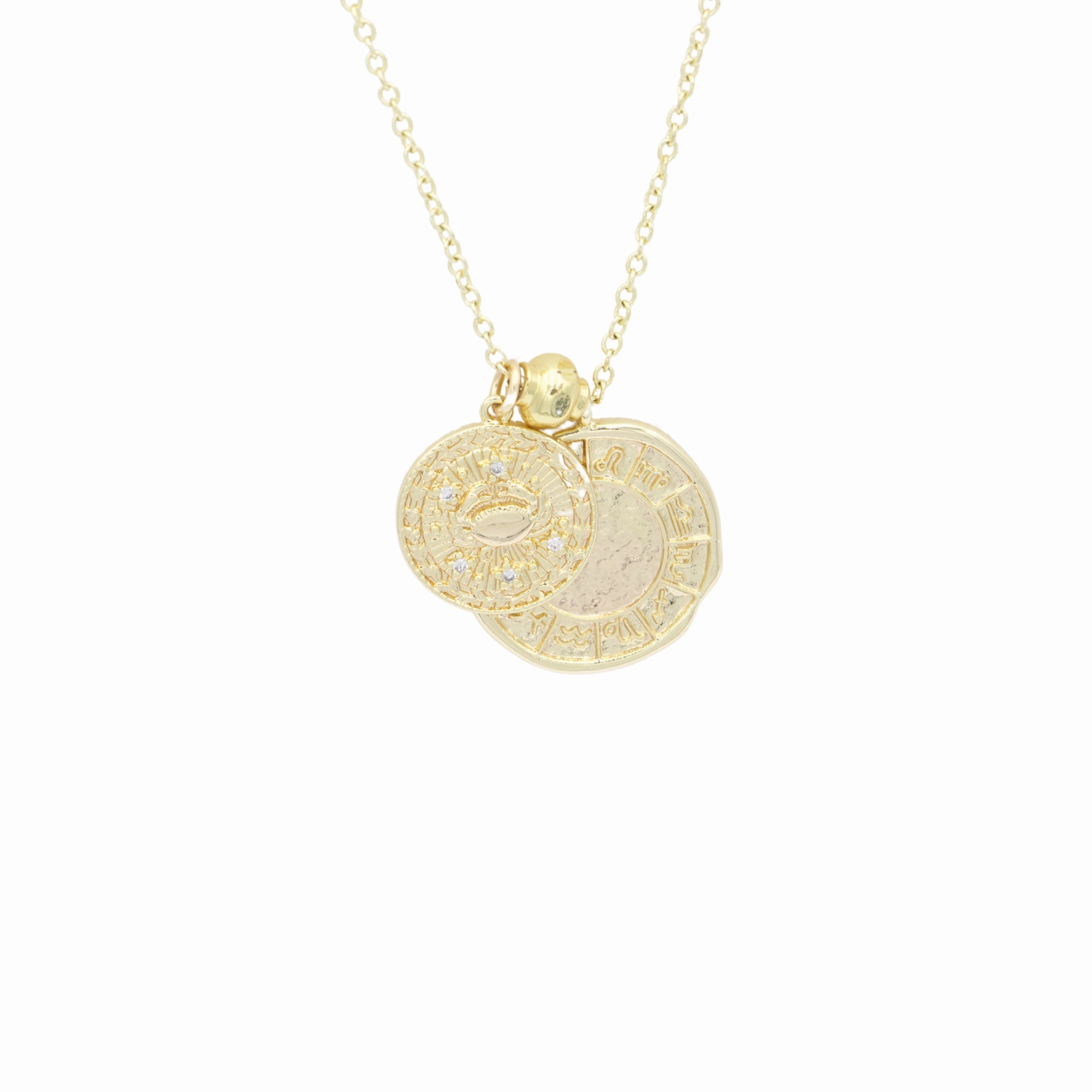 AW Boutique's dual zodiac coin necklace featuring a dainty necklace chain, zodiac rustic coin charm, and your chosen star sign coin charm. Charms separated by a gold bead. Part of the Celestial Collection. Gold filled jewellery. Option shown is Cancer.