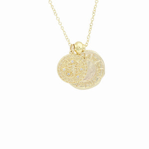 AW Boutique's dual zodiac coin necklace featuring a dainty necklace chain, zodiac rustic coin charm, and your chosen star sign coin charm. Charms separated by a gold bead. Part of the Celestial Collection. Gold filled jewellery. Option shown is Sagittarius.