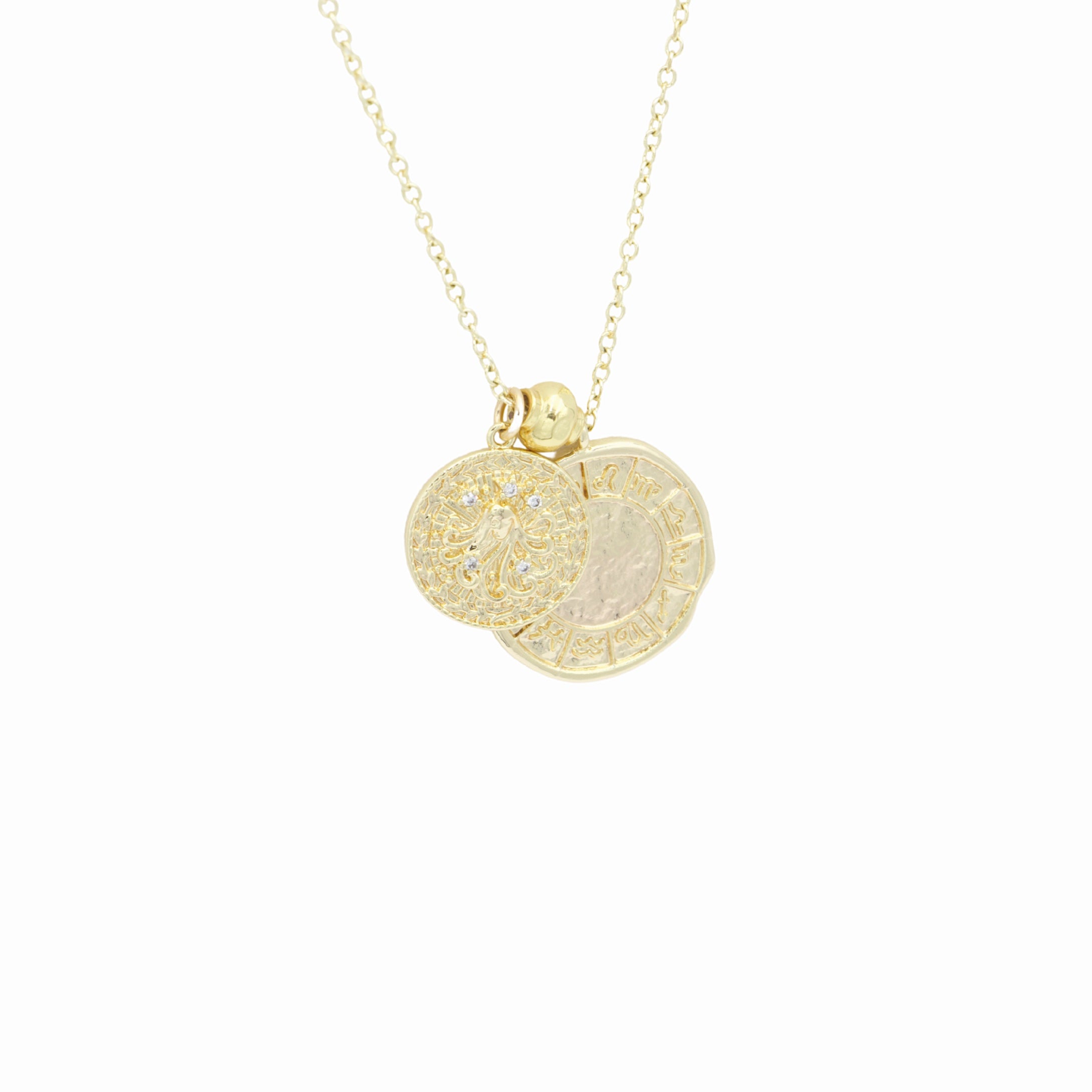 AW Boutique's dual zodiac coin necklace featuring a dainty necklace chain, zodiac rustic coin charm, and your chosen star sign coin charm. Charms separated by a gold bead. Part of the Celestial Collection. Gold filled jewellery. Option shown is Virgo.