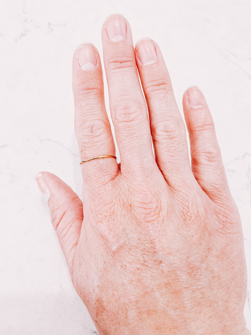 Plain Stacker ring worn on hand by lady startup Australian jewellery label, AW Boutique.